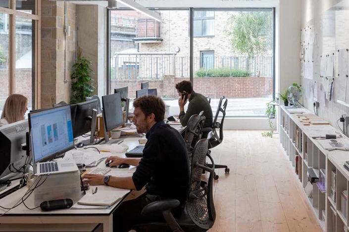 About us - architect at workstation